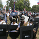 White nationalist demonstrators hold their ground as they clash with counter demonstrators in Lee Park.